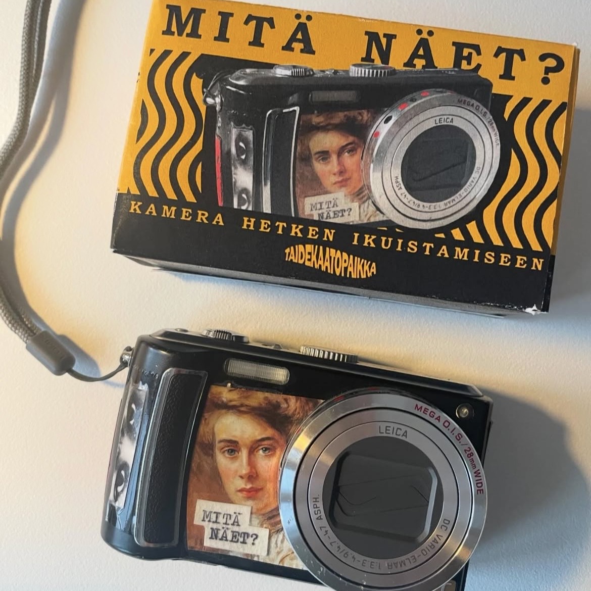 pakkaus pienelle kameralle